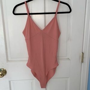 Ribbed body suit with adjustable straps